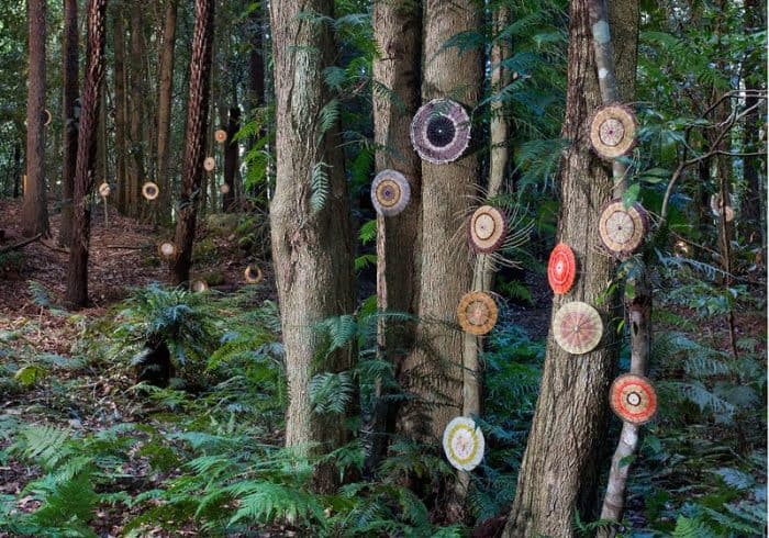 sculptures at scenic word amongst trees